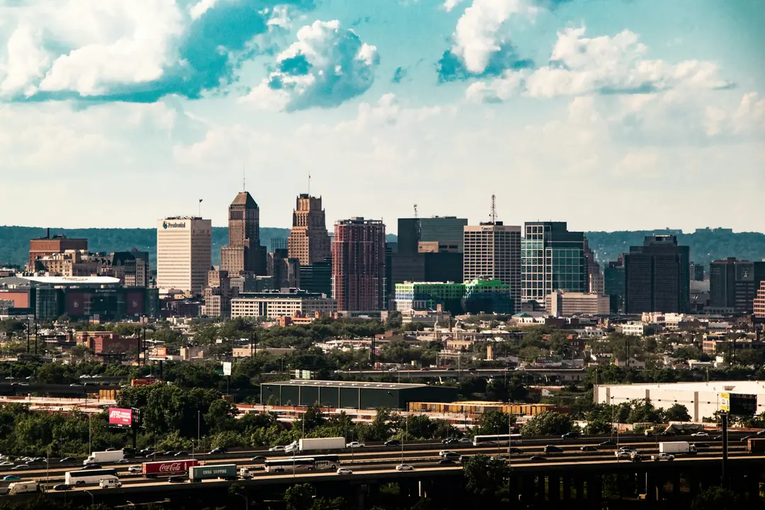 The downtown skyline seen across a city of low-rise buildings